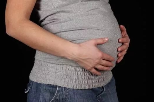 Может ли при беременности болеть живот внизу